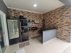 Casa em Guarujá com piscina